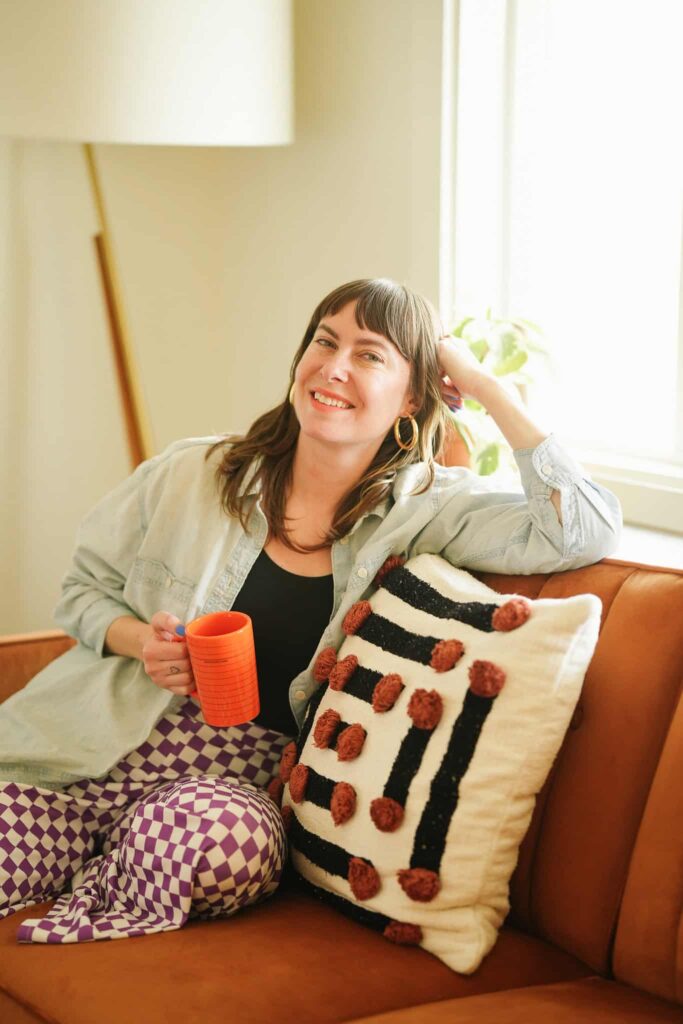 An LGBTQ real estate agent is photographed by queer joy photo in Denver